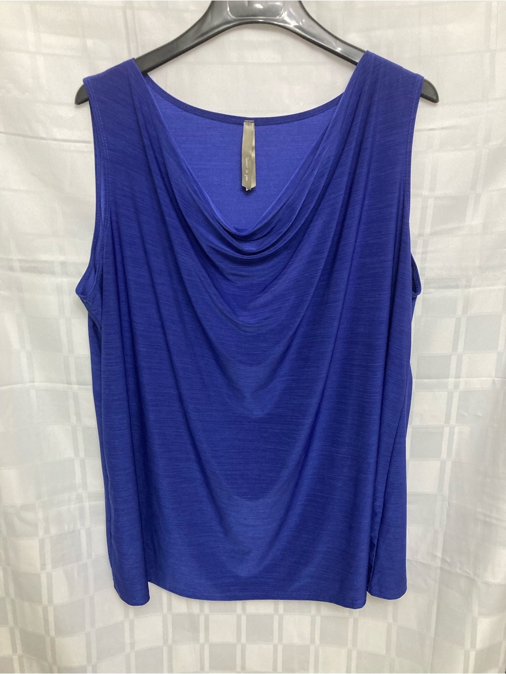 Sleeveless top cowl neckline